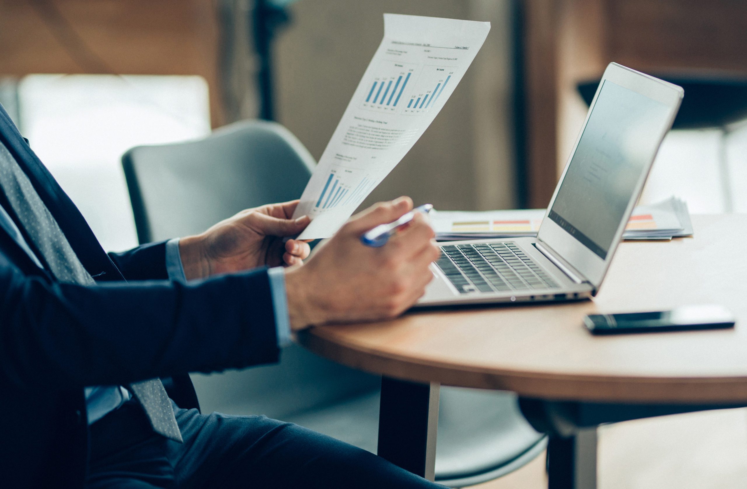 Man checking his asset allocation on laptop