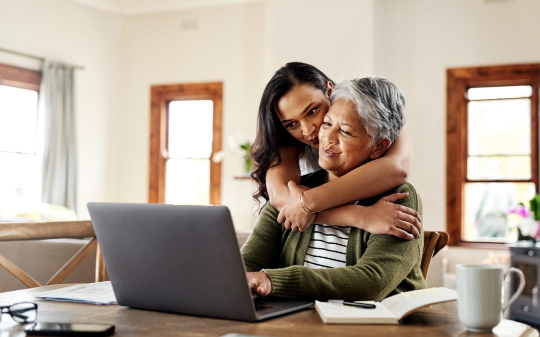 Mother and daughter looking at a financial plan