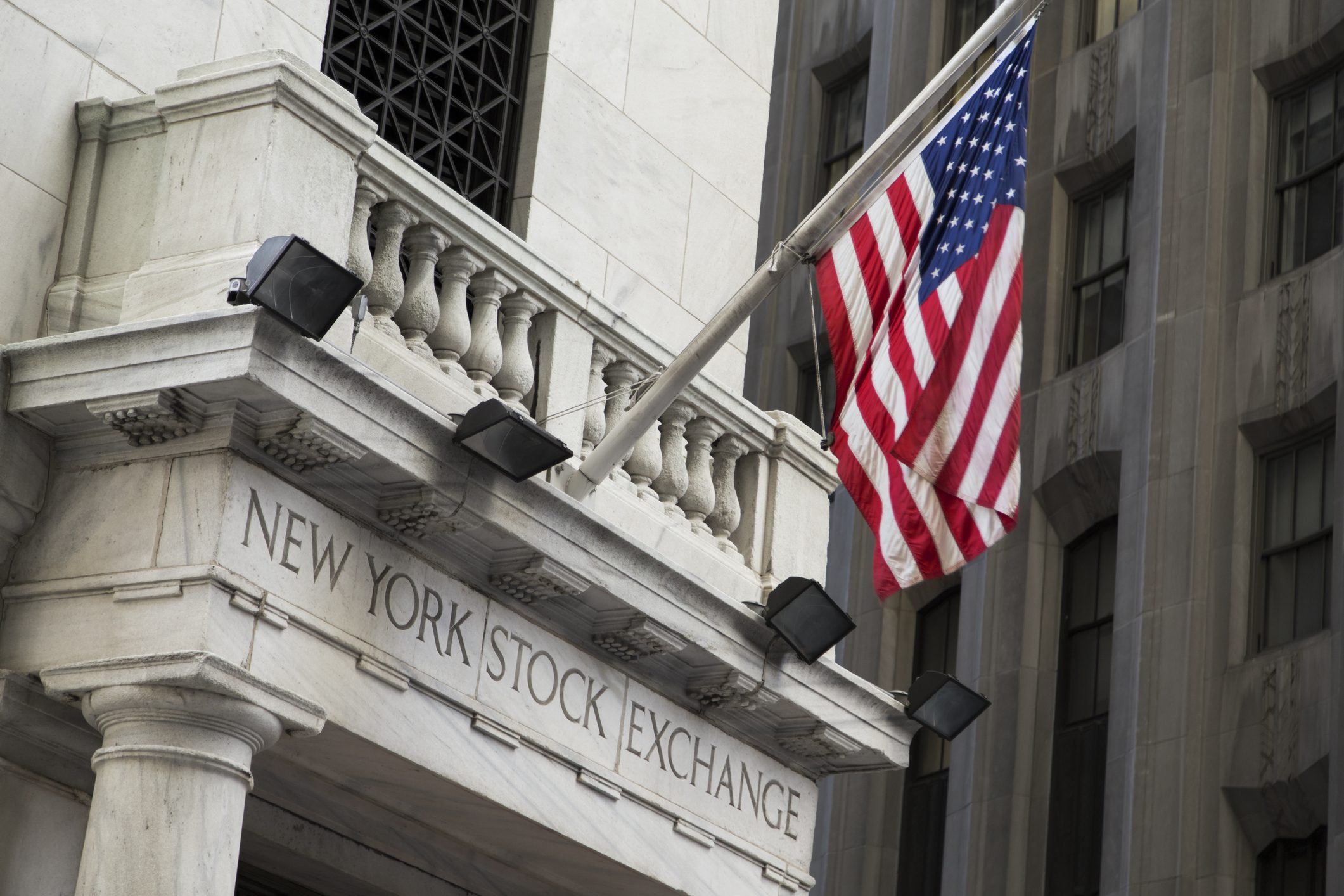 New York Stock Exchange Building Exterior with American Flag Hanging