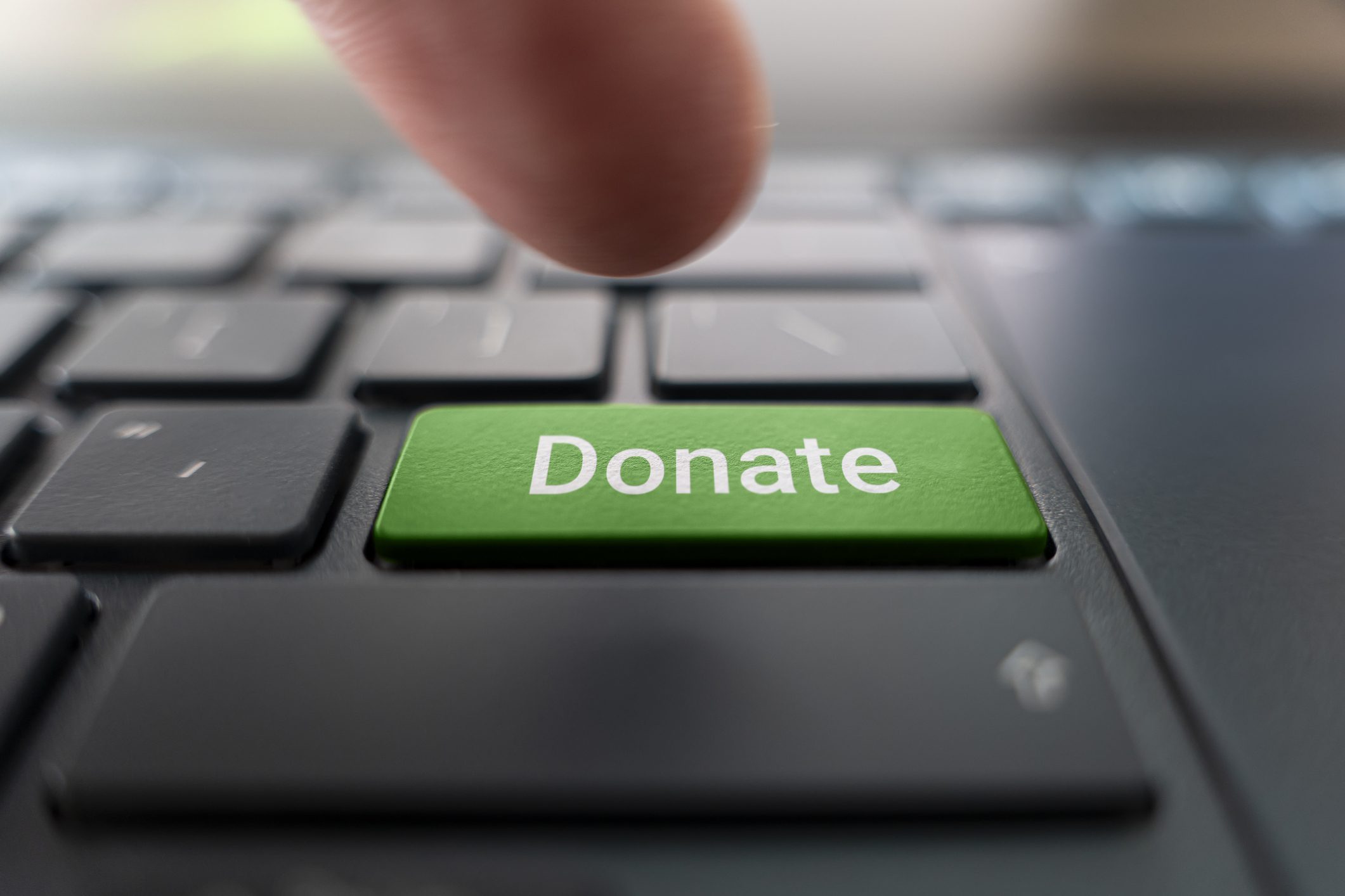 Keyboard with donate button to represent using a donor-advised fund