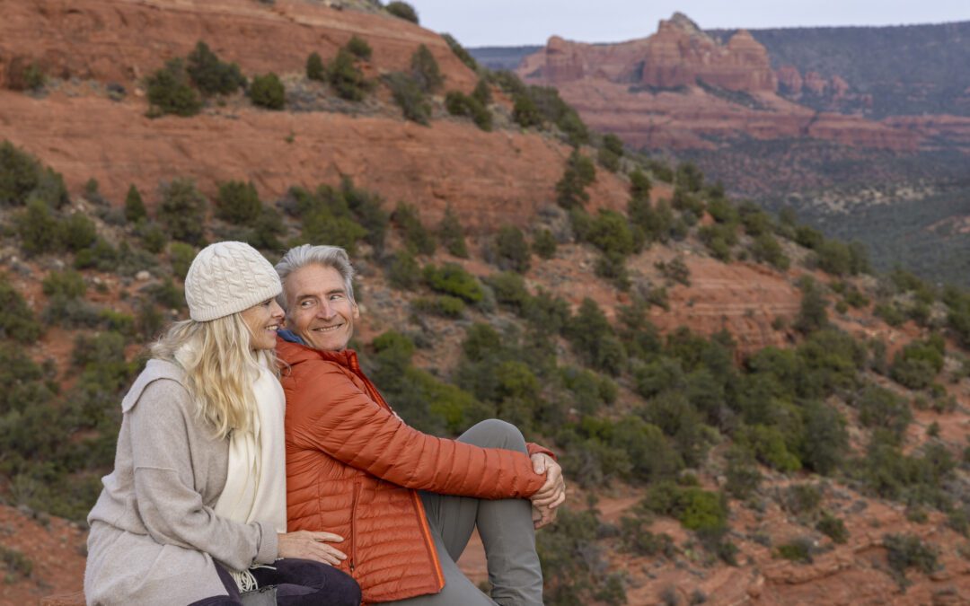 Mature couple enjoy view in desert landscape
