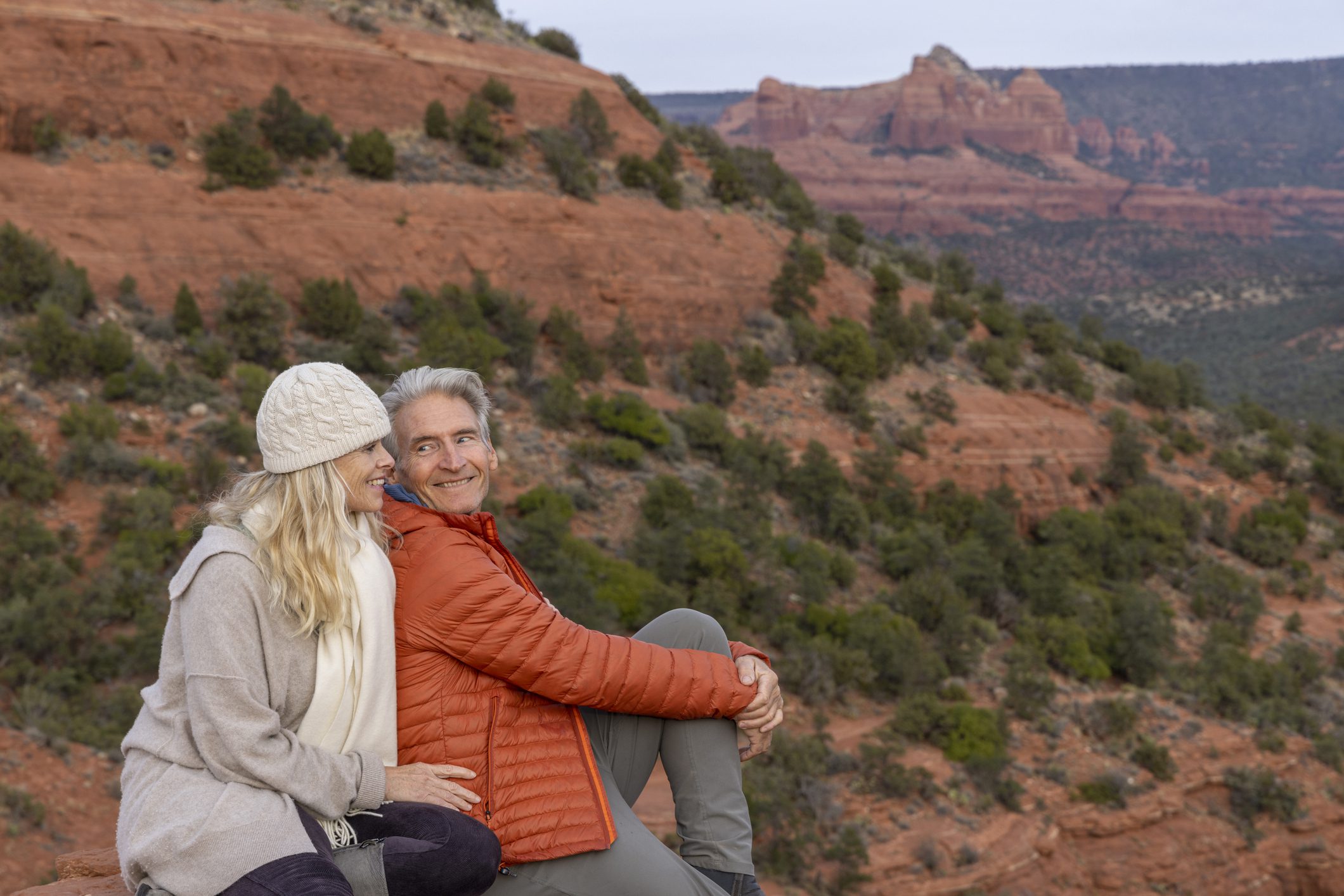 Mature couple enjoy desert landscape Mature couple enjoy view in desert landscape